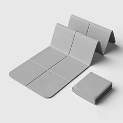 Kompakt hopfällbar yogamatta